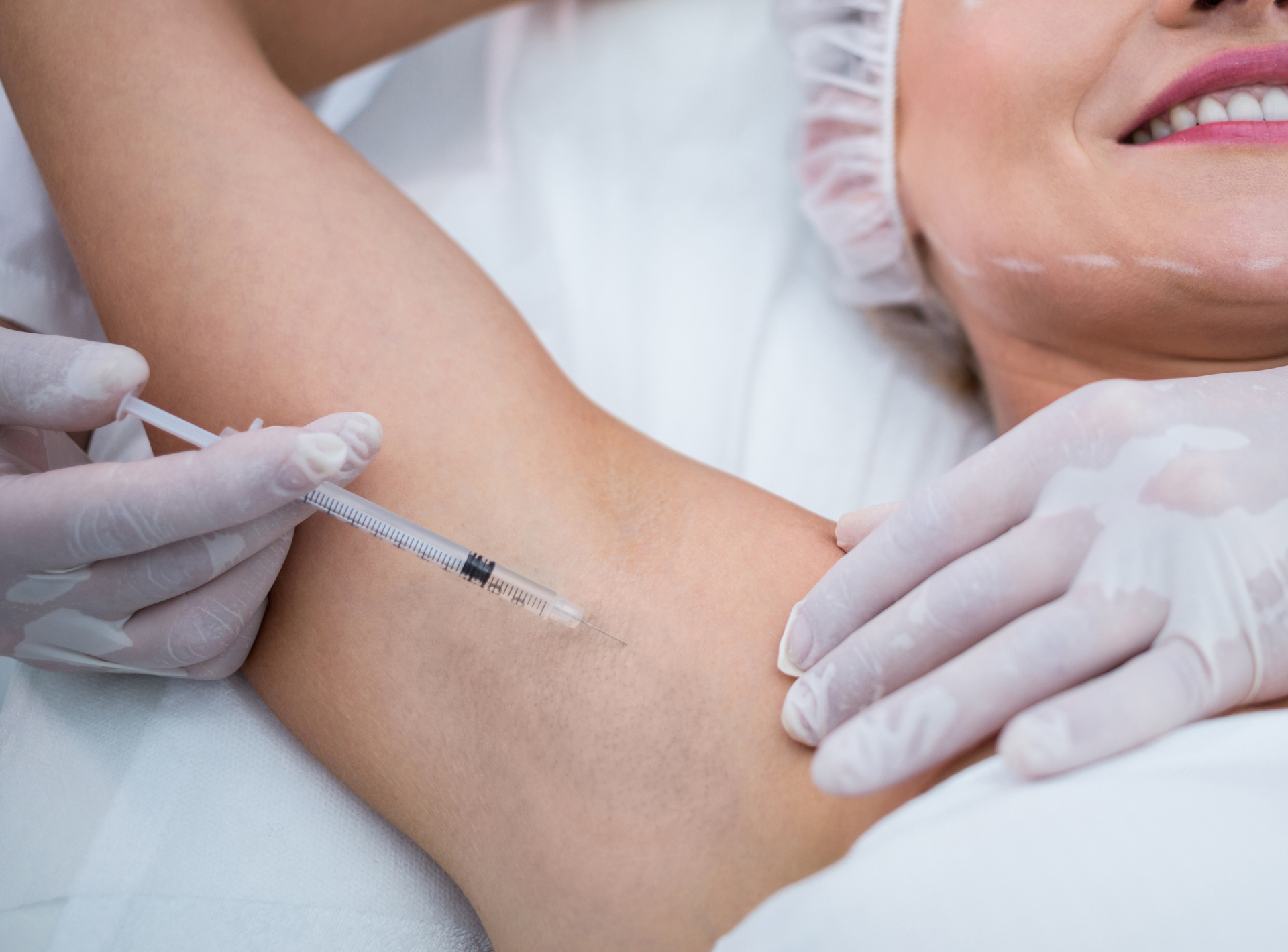 Confident client considering hyperhidrosis treatment
