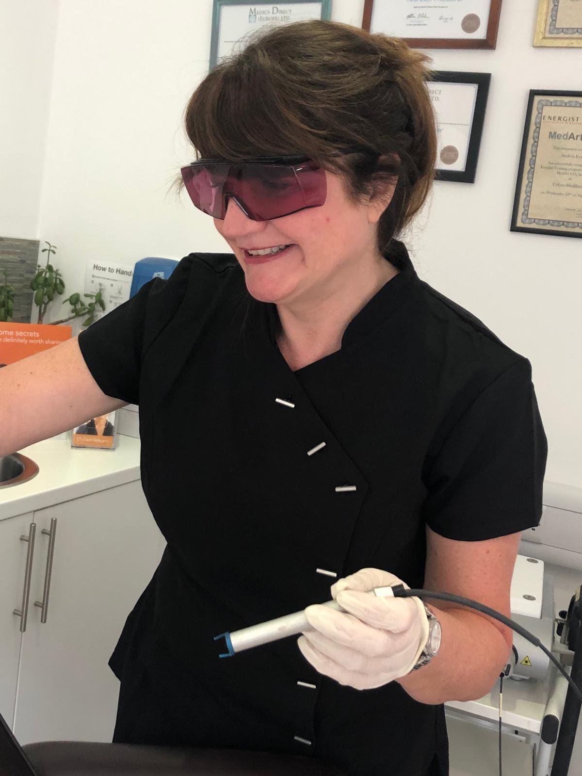 Vale Laser practitioner with laser equipment