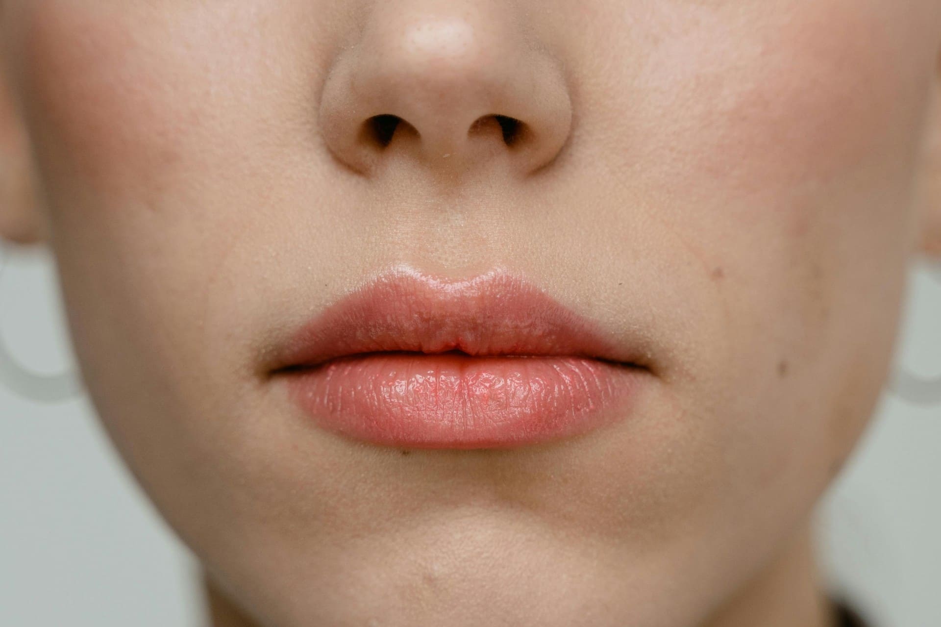 Natural lips close-up considering lip augmentation