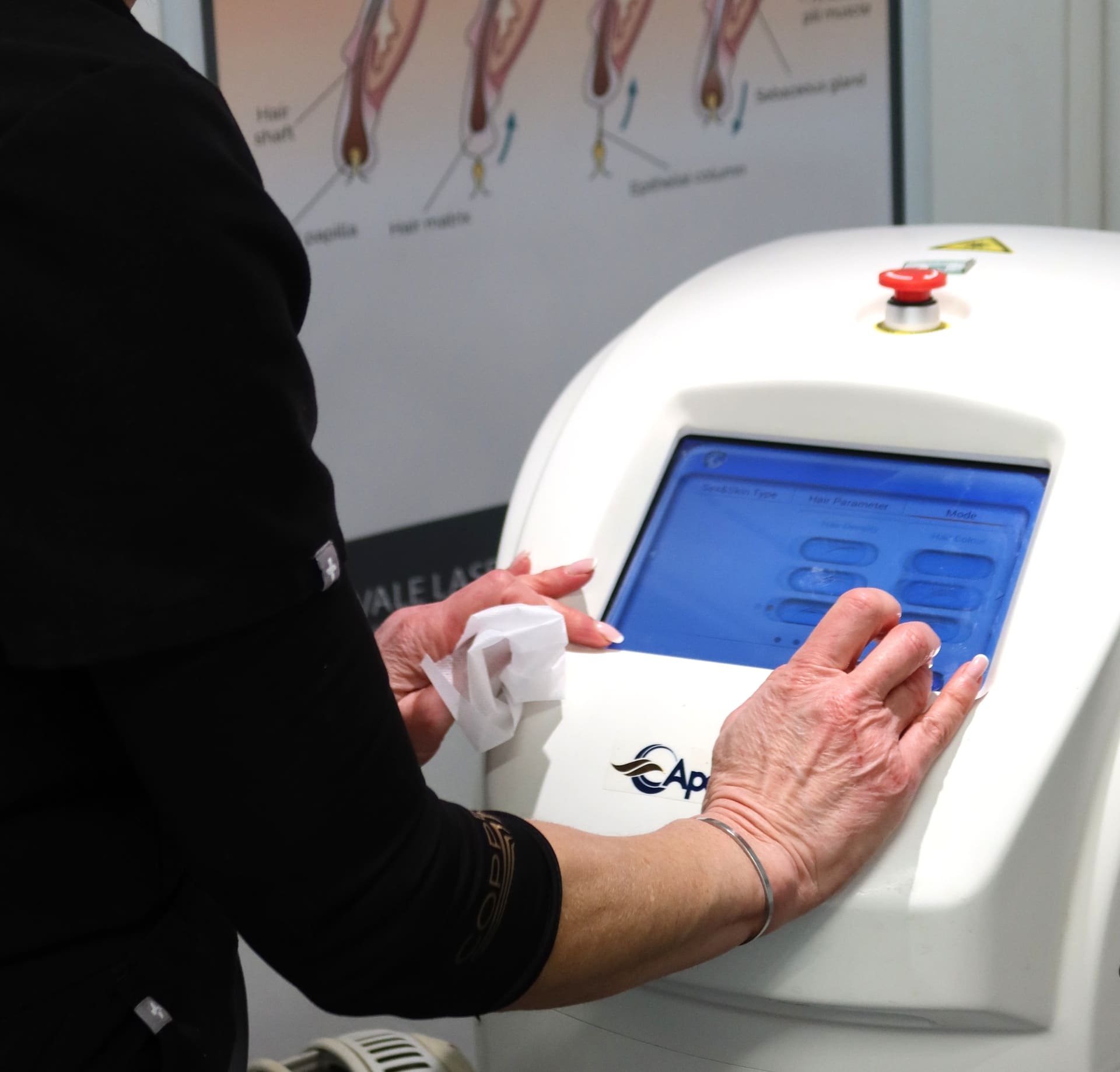 Practitioner operating laser hair removal device at Vale Laser Whitchurch
